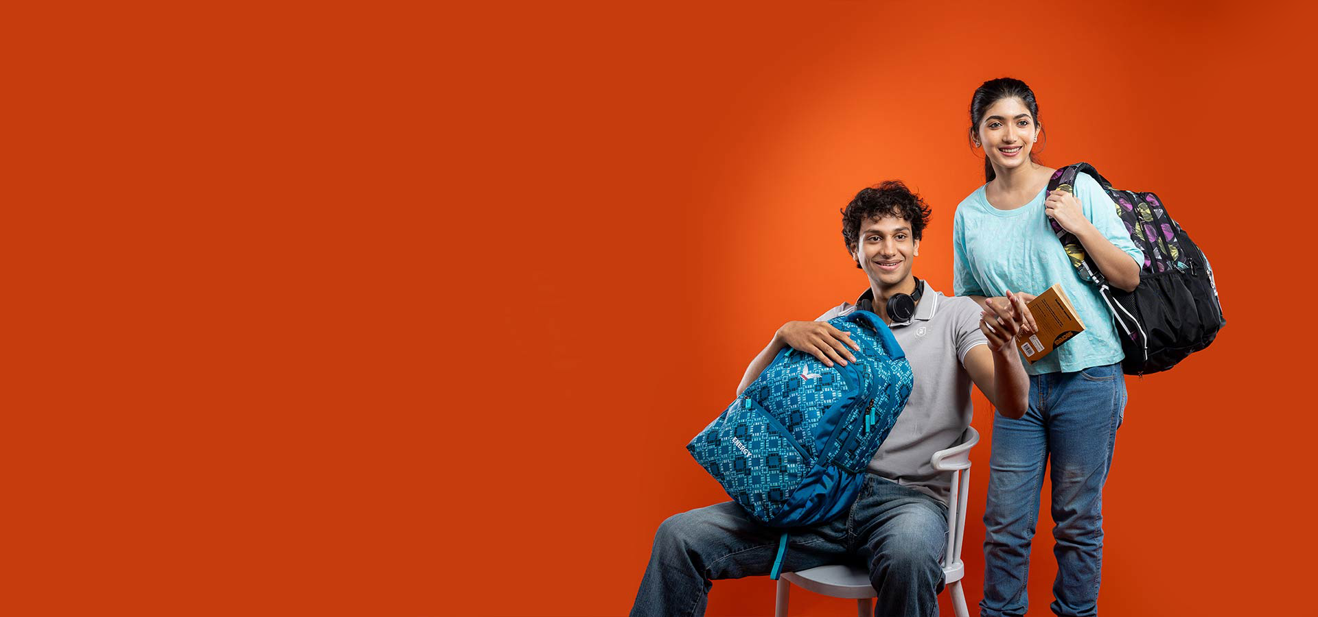 Energy Bags  models sitting with orange background